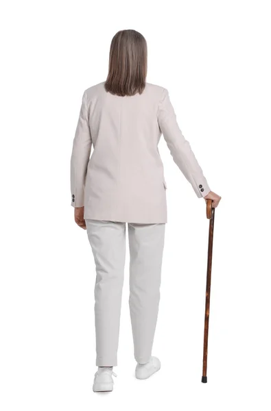 有白色背景手杖的老年妇女 后视镜 — 图库照片