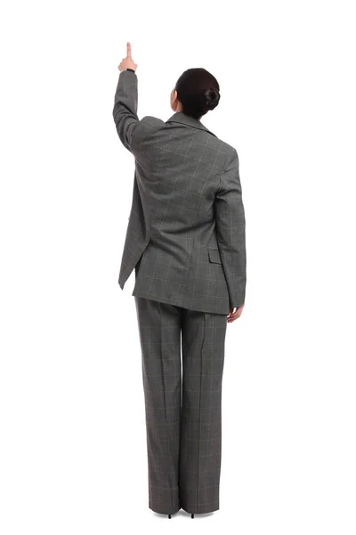 Affärskvinna Kostym Pekar Något Vit Bakgrund Baksida — Stockfoto