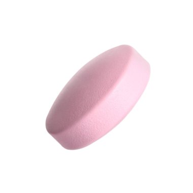 Beyaz arka planda pembe bir hap. Tıbbi tedavi