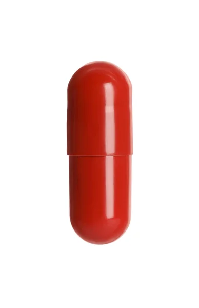 Jedna Červená Pilulka Bílém Pozadí Léčivá Léčba — Stock fotografie