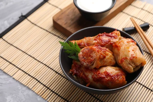 Delicious Stuffed Cabbage Rolls Cooked Tomato Sauce Grey Table Closeup — Stock Photo, Image