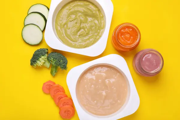 stock image Flat lay composition with healthy baby food and ingredients on yellow background