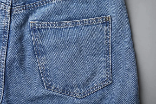 Jeans Con Tasca Sfondo Grigio Vista Dall Alto — Foto Stock