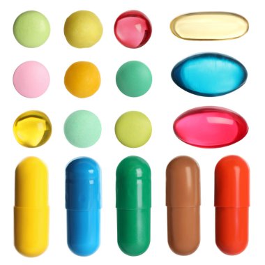 Beyaza izole edilmiş farklı haplar.