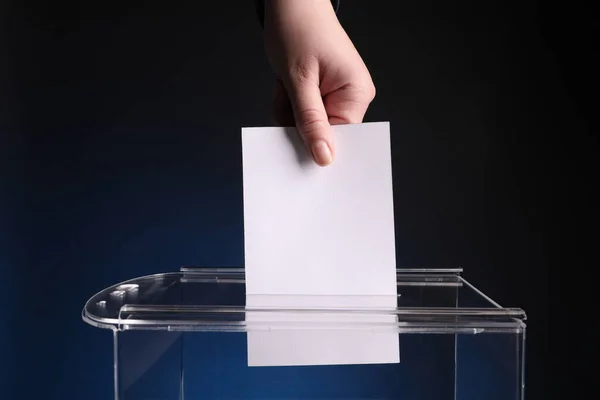 Woman Putting Her Vote Ballot Box Dark Blue Background Closeup — Stock Photo, Image
