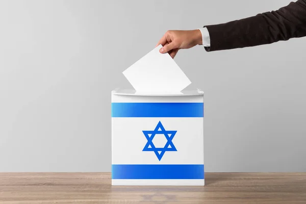 Woman Putting Her Vote Ballot Box Decorated Flag Israel Light — Stock Photo, Image