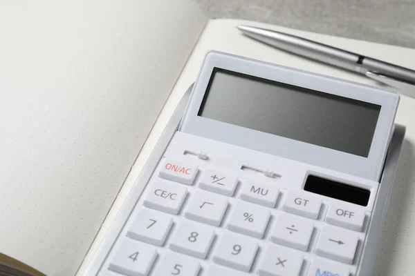 Calculator Pen Open Notebook Closeup — Stock Photo, Image