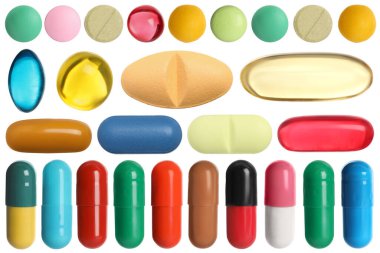 Beyaza izole edilmiş farklı haplar.