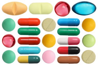 Beyaza izole edilmiş farklı haplar.