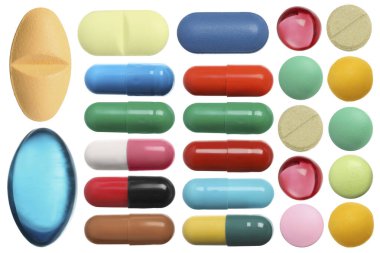 Beyaza izole edilmiş farklı haplar.