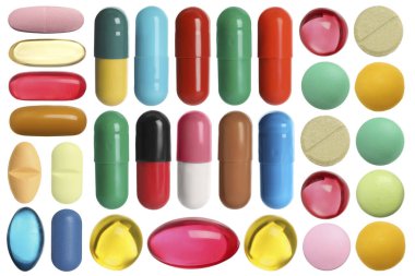 Beyaza izole edilmiş farklı haplar.