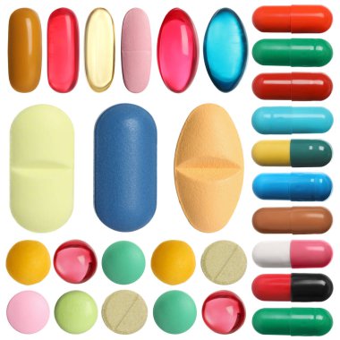 Beyaza izole edilmiş farklı haplar.