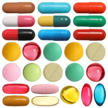 Beyaza izole edilmiş farklı haplar.