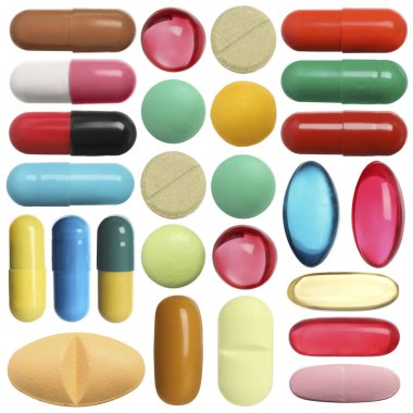 Beyaza izole edilmiş farklı haplar.