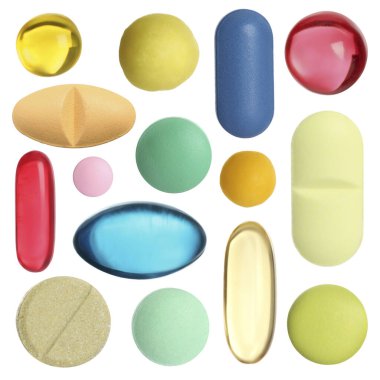 Beyaza izole edilmiş farklı haplar.