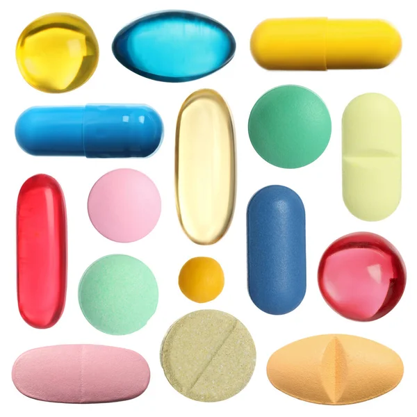 Beyaza izole edilmiş farklı haplar.