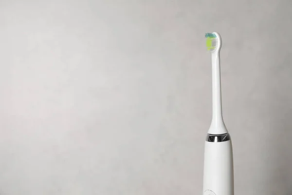 Electric Toothbrush Light Background Space Text — Stock Photo, Image