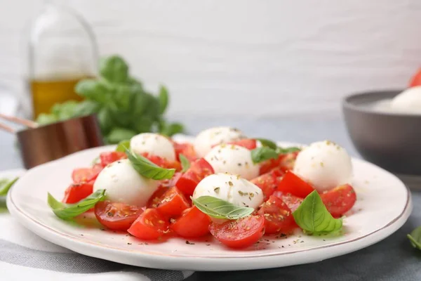Tasty Salad Caprese Tomatoes Mozzarella Balls Basil Table Closeup Space — Stock Photo, Image