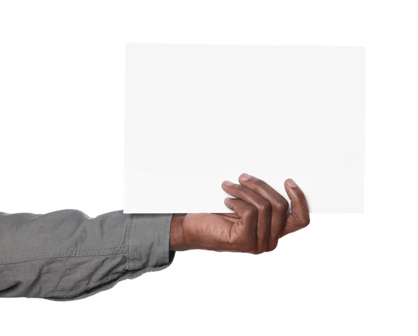African American Man Holding Sheet Paper White Background Closeup Mockup — Stock Photo, Image