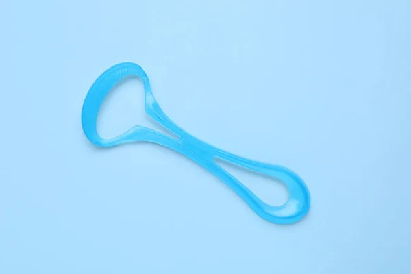 Tongue Cleaner Light Blue Background Top View — Stock Photo, Image