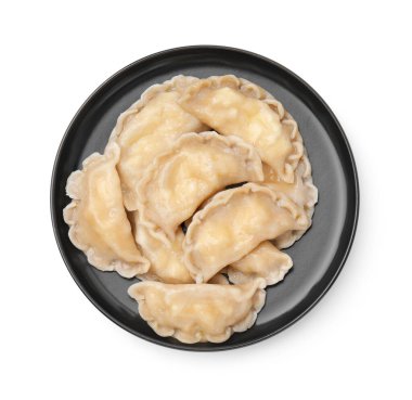 Bir tabak lezzetli hamur köftesi (varenyky) ve süzme peynir beyaz, üst görünümde izole