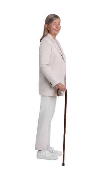 有白色背景手杖的老年妇女 — 图库照片