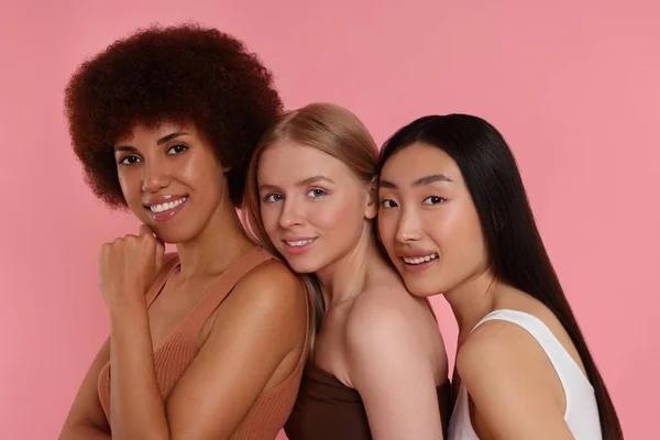 stock image Portrait of beautiful young women on pink background