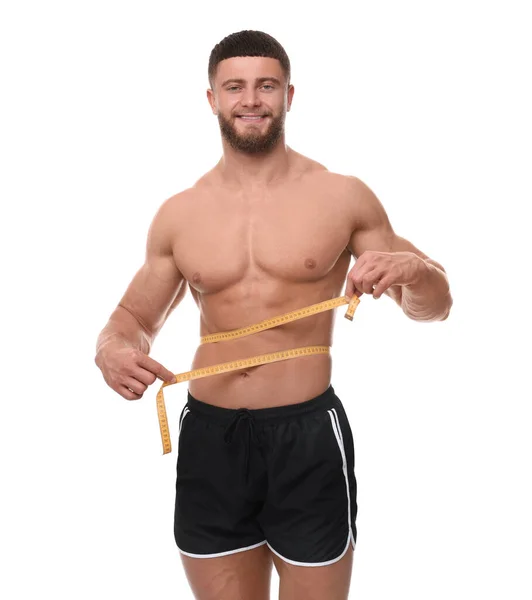 Homem Atlético Feliz Medindo Cintura Com Fita Adesiva Sobre Fundo — Fotografia de Stock