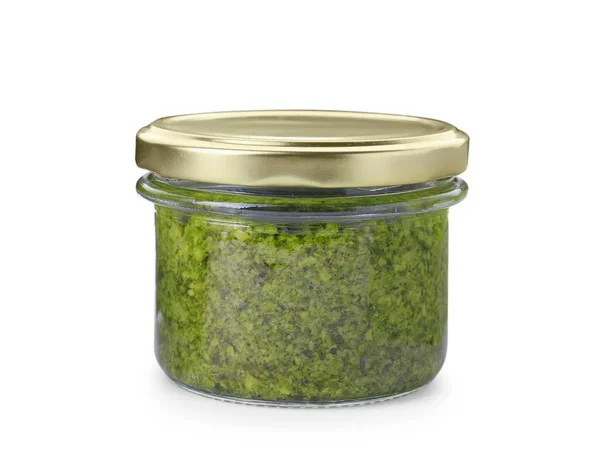 stock image Jar with delicious pesto sauce isolated on white