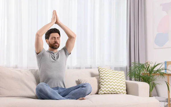 Man Meditating Sofa Home Space Text — Stock Photo, Image