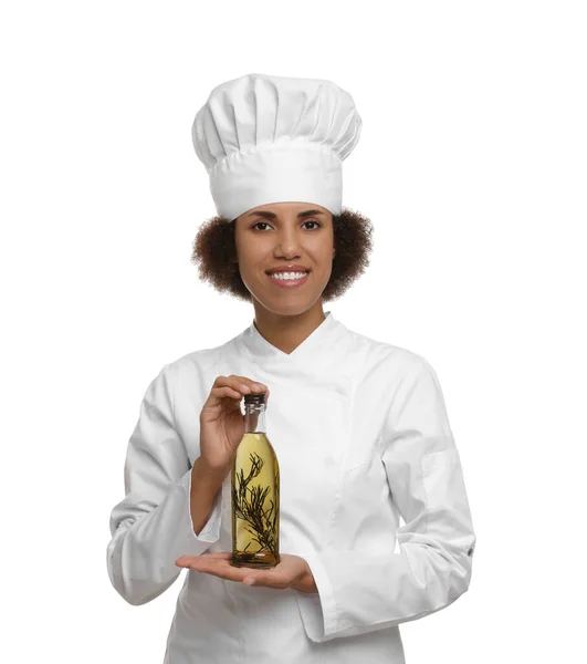 Chef Feminino Feliz Uniforme Segurando Garrafa Óleo Cozinha Fundo Branco — Fotografia de Stock