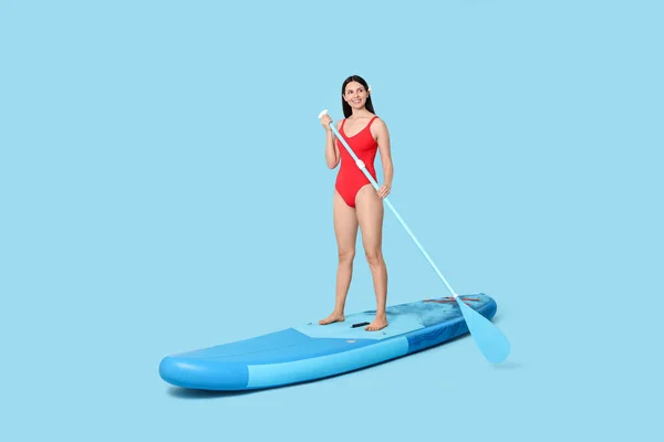 Happy Woman Paddle Sup Board Light Blue Background Space Text — Stock Photo, Image