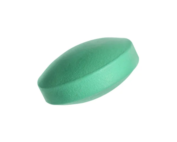 Egy Zöld Tabletta Fehér Háttérrel Gyógyszeres Kezelés — Stock Fotó