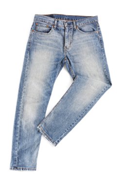 Blue jeans isolated on white, top view. Stylish clothes