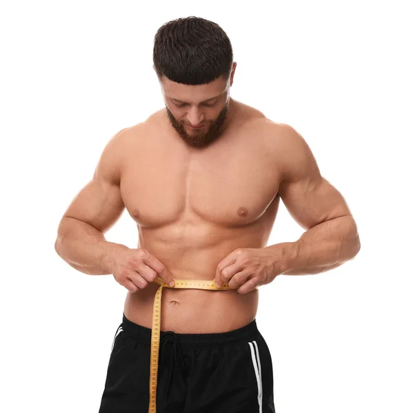 Homem Atlético Medindo Cintura Com Fita Adesiva Sobre Fundo Branco — Fotografia de Stock