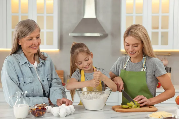Three Generations Happy Grandmother Her Daughter Granddaughter Cooking Together Kitchen — Stok fotoğraf