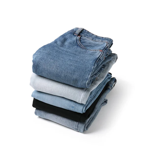 Stapel Verschiedener Gefalteter Jeans Isoliert Auf Weißem Grund — Stockfoto
