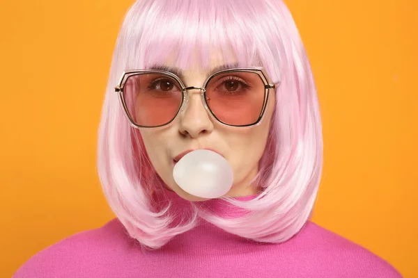 Beautiful Woman Sunglasses Blowing Bubble Gum Orange Background — Stock Photo, Image
