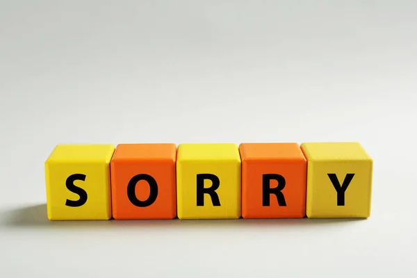 Apology Word Sorry Made Colorful Cubes Light Background Space Text — Stock Photo, Image