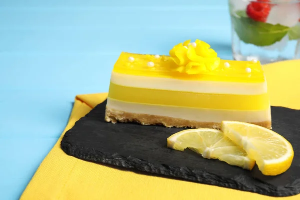 Delicious Cheesecake Lemon Light Blue Wooden Table Closeup Space Text — Stock Photo, Image