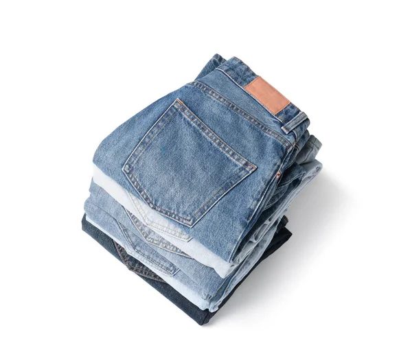 Pila Diversi Jeans Piegati Isolati Bianco — Foto Stock