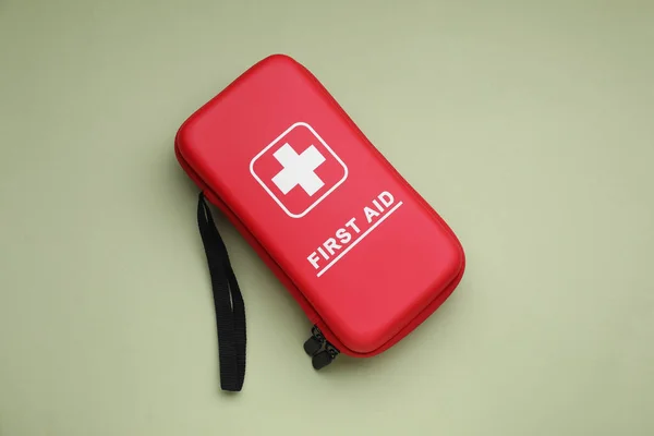 First Aid Kit Light Green Background Top View — Stock Photo, Image