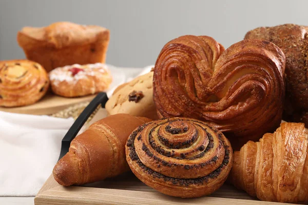 Different Tasty Freshly Baked Pastries Table Closeup — Stock Photo, Image