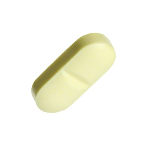 Ett Ljusgrönt Piller Vit Bakgrund Läkemedelsbehandling — Stockfoto