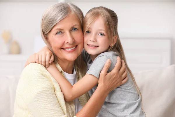 Happy Grandmother Hugging Her Granddaughter Home — Stock Photo, Image
