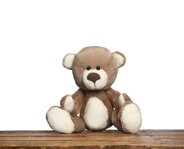 Niedlicher Teddybär Auf Holztisch Vor Weißem Hintergrund — Stockfoto