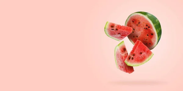 Cut Juicy Watermelon Falling Pink Background Space Text Banner Design — Stock Photo, Image
