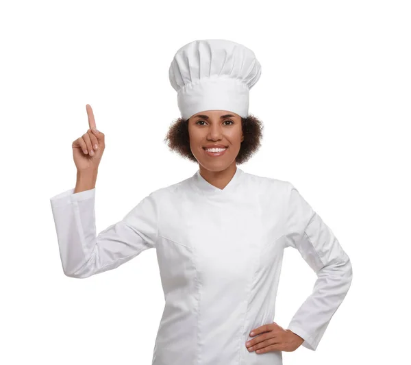 Happy Female Chef Uniform Pointing Something White Background — Stock Photo, Image
