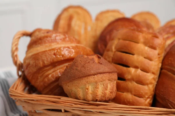 Wicker Basket Different Tasty Freshly Baked Pastries Closeup — Stock Photo, Image