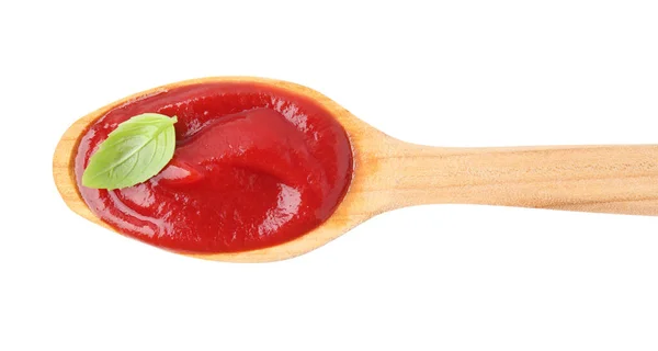 Houten Lepel Met Smakelijke Ketchup Basilicum Geïsoleerd Wit Bovenaanzicht — Stockfoto